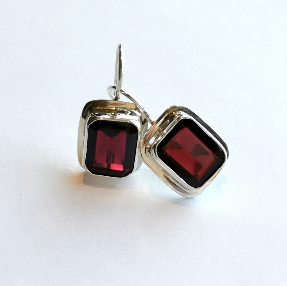 Emerald cut garnet drop earrings in Sterling Silver